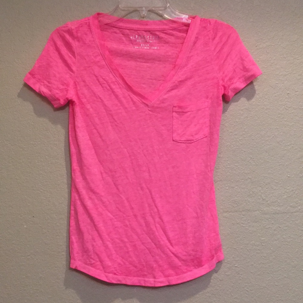 pink  v neck shirt